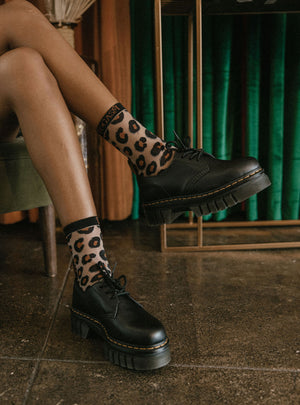 Leopard print sheer socks worn with docs for alternative fashion and rocker chic style. 