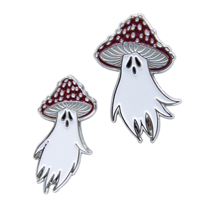 Two enamel pins of ghosts with mushrooms on their heads. Silver toned metal, red, white, and black enamel. 