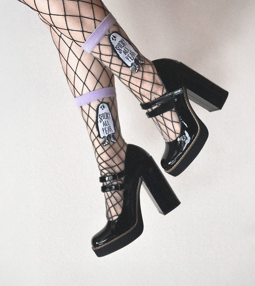 Cool sheer socks in black, white, and lavender with a ghost and a funny quote on them. 