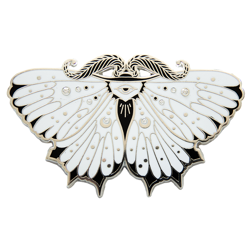 A .925 silver plated enamel pin of a moth, set with white moissanite gemstones for alternative fashion and luxury punk style.