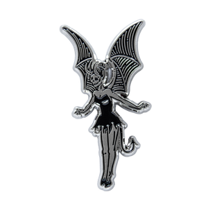 A spooky enamel pin of a fairy with devil wings and a skeleton's face, in silver and black. 