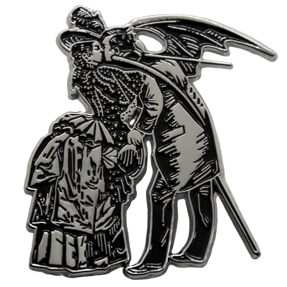 A cool enamel pin inspired by victorian art for goth fashion in black and silver.