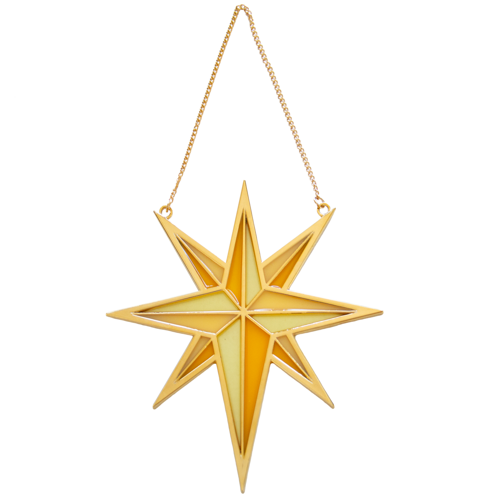A beautiful gold and yellow suncatcher in the shape of a star for witchy, celestial, and astrology inspired home decor. 