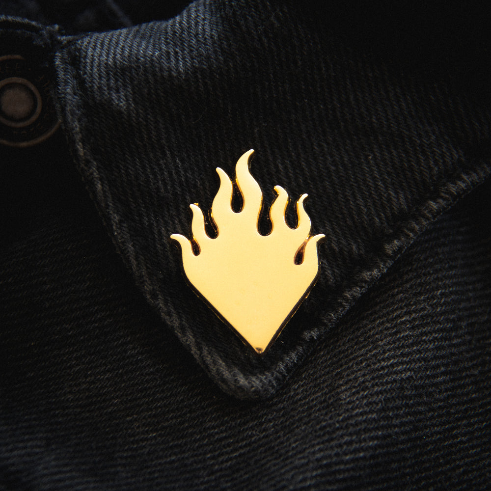 Ectogasm gold flame shaped pins to wear on the collars of a battle jacket or vest for unique unisex punk style. 