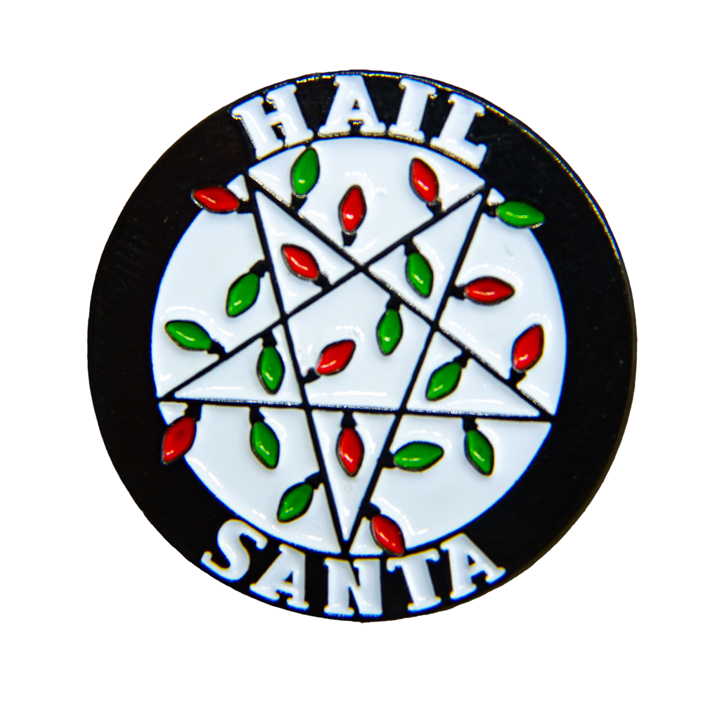 A funny enamel pin of a pentagram made of Christmas lights and the quote, "hail Santa". 