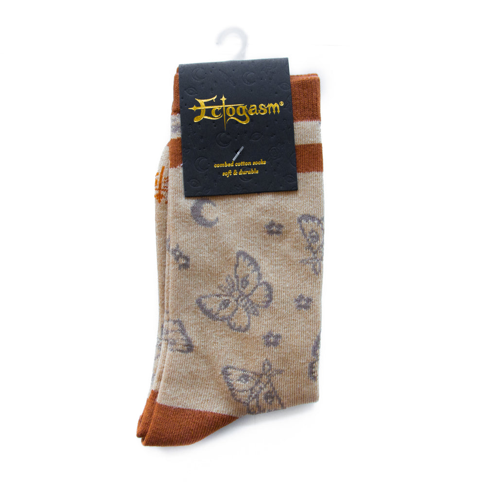 Women's cute moths and moons long socks for a cottage core style in brown and orange. 