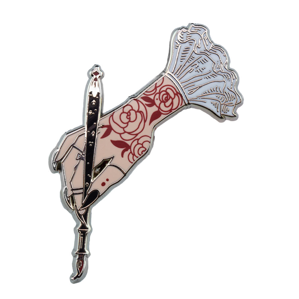 Ectogasm victorian gothic style enamel pin of a hand with a paint brush.