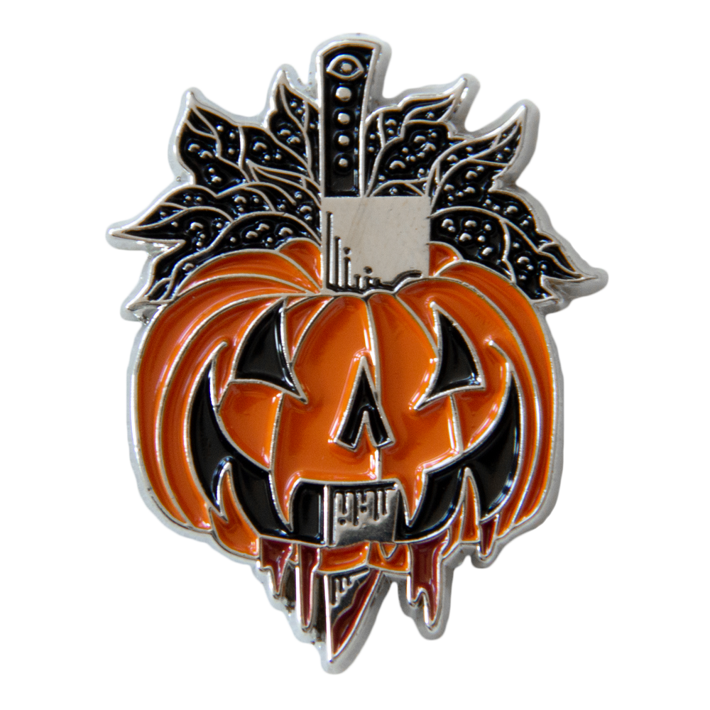 A cool horror themed Halloween enamel pin of a stabbed jack-o-lantern.