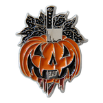 A cool horror themed Halloween enamel pin of a stabbed jack-o-lantern.