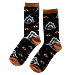 Ectogasm occult inspired crew socks with a pattern of eyes, clouds, and stars for dark elegant fashion. 