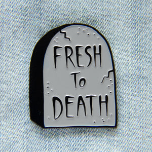 Cool tombstone enamel pin with the quote, "Fresh to Death". 