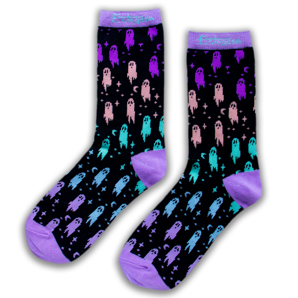 Rainbow colored crew socks with ghosts, moons, and stars on them for witchy fashion.