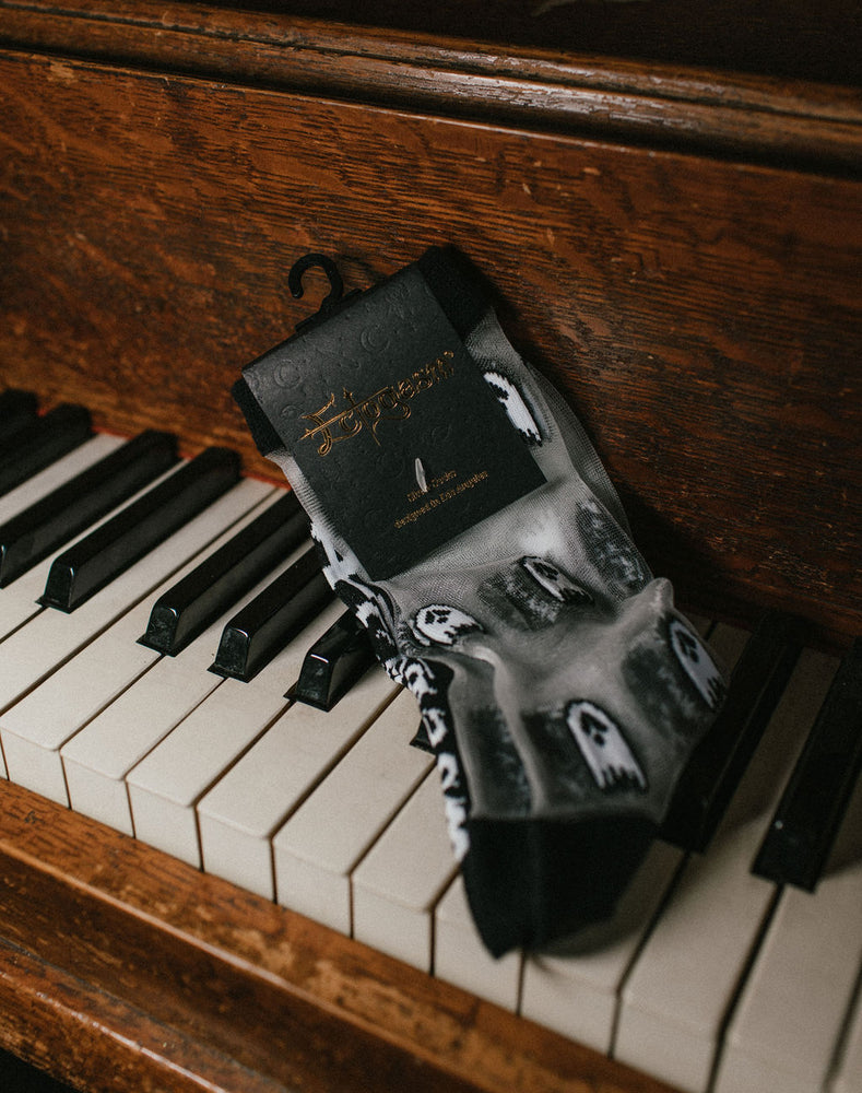 
            
                Load image into Gallery viewer, Ectogasm sheer spooky ghost socks in black and white. 
            
        
