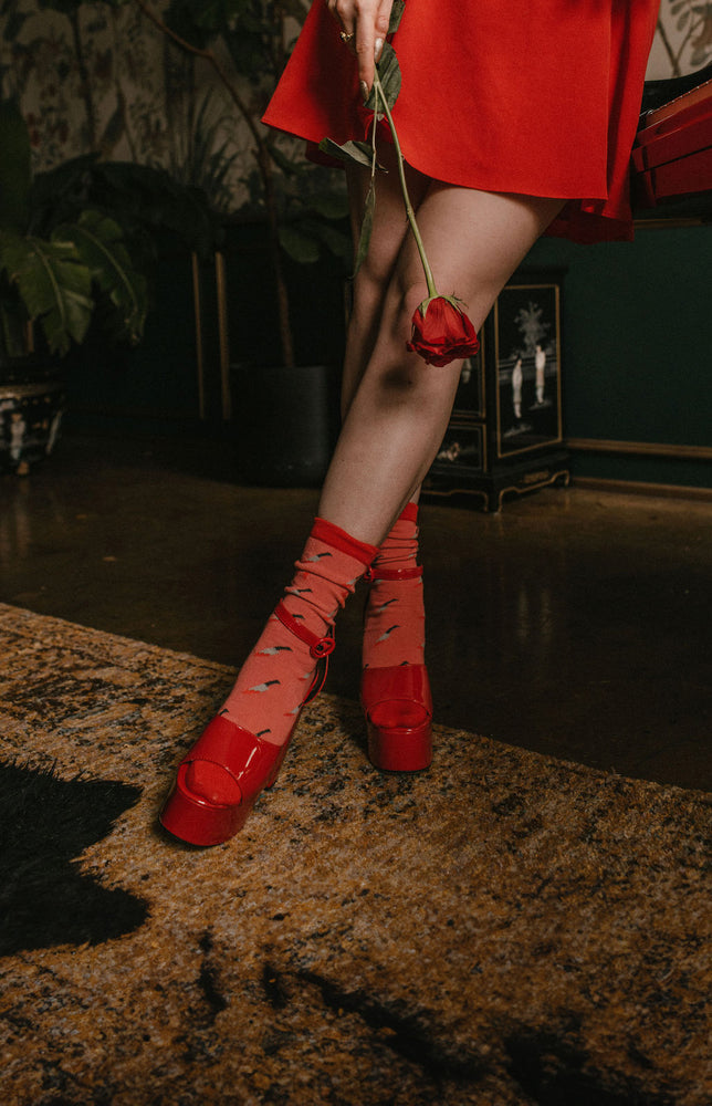 
            
                Load image into Gallery viewer, Red and pin socks worn with heels and a dress for a date night outfit that slays.
            
        