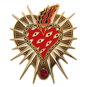 A large 18k gold plated enamel pin brooch of a sacred heart with eyes in tattoo style for punk fashion.