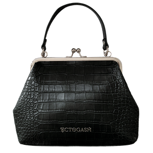 A vintage style clasp purse made with black crocodile skin vegan leather and silver hardware. 