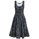 A women's goth fashion midi dress with a witchy print on the fabric in black and gray. 