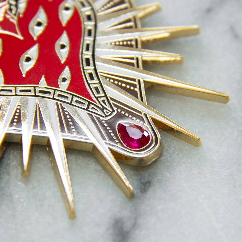 Ruby gemstone inlaid in an Ectogasm enamel pin brooch for cool fashion, designed in California.