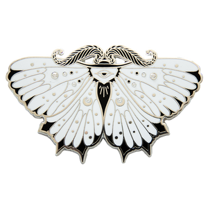 A .925 silver plated enamel pin of a moth, set with white moissanite gemstones for alternative fashion and luxury punk style.