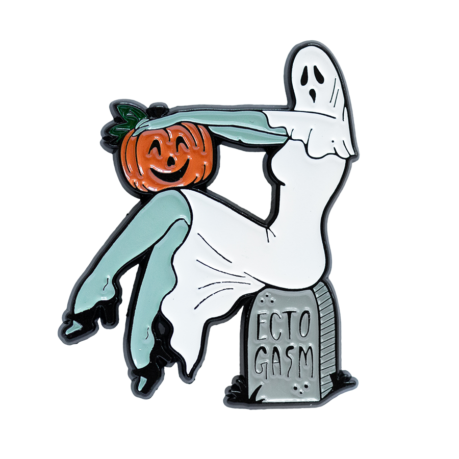 A spooky enamel pin of a vintage pinup ghost woman holding a pumpkin. 