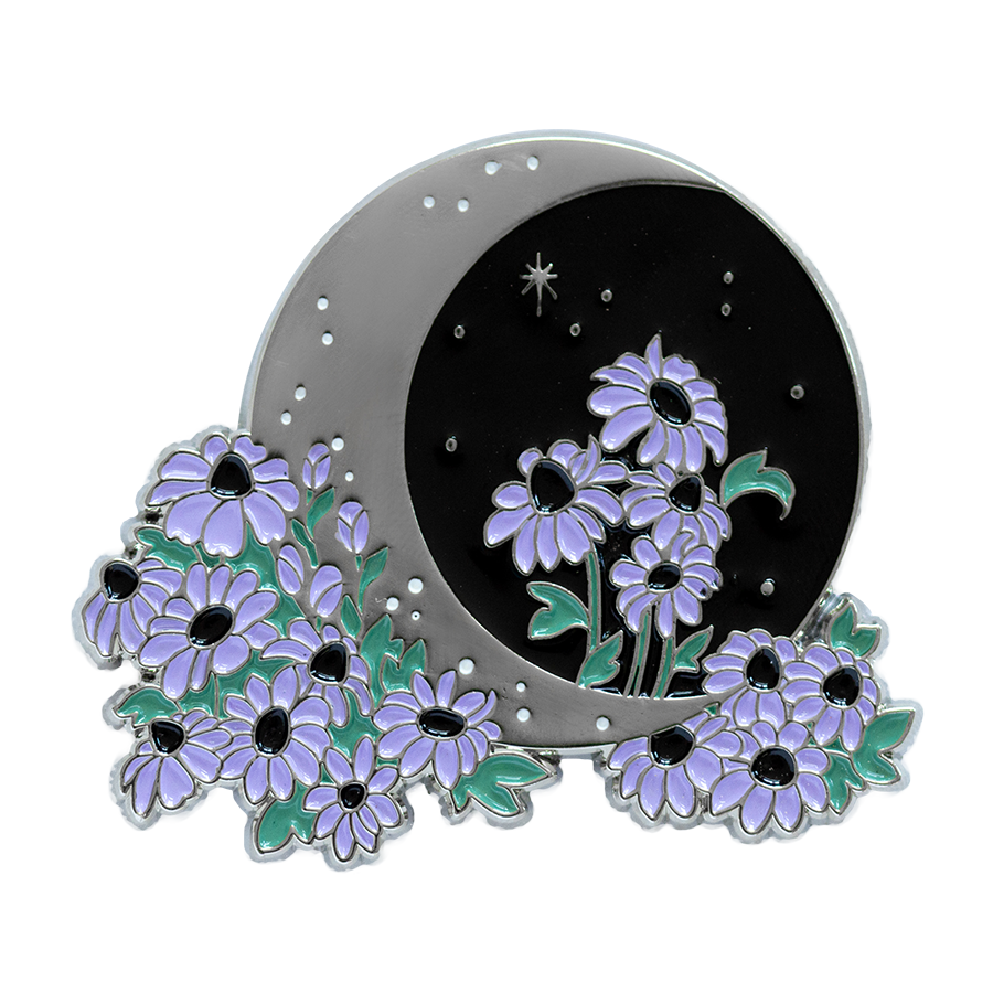 A witch aesthetic enamel pin of a crescent moon with night sky, stars, and purple flowers. 