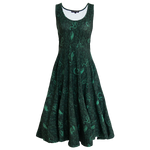 A green fit and flare dress with a witch aesthetic snake and botanical print. 