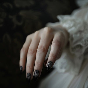 Silver witchy nail stickers for a gothic manicure.