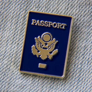 
            
                Load image into Gallery viewer, Enamel lapel pin of a passport.
            
        