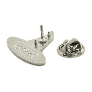 A metal clasp on the back of a pointed witch hat enamel pin. 
