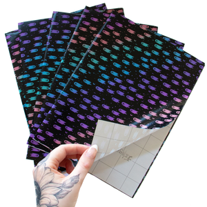 5 sheets of Ectogasm creepy cute rainbow gift wrap for birthdays and Christmas.