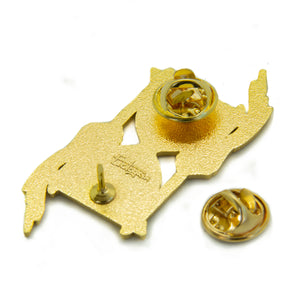 Clasps on the back of a gold enamel pin for unisex fashion. 