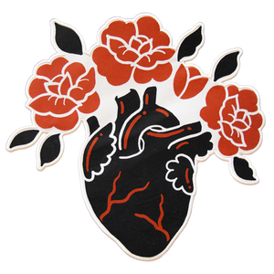 A cool black, red, and white back patch of an anatomical heart blooming with roses. 