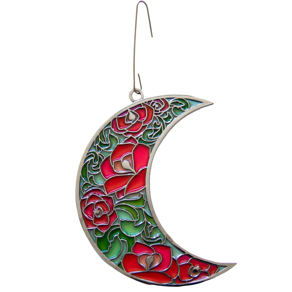 A beautiful celestial moon shaped sun catcher for boho home decor.