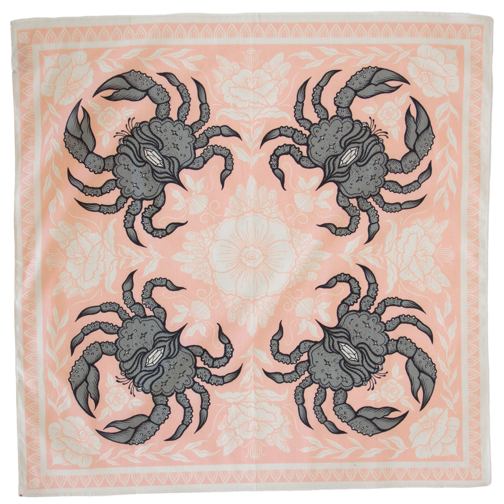 Ectogasm brand bandana or alter cloth of a beautiful crab surrounded by crystals and a floral pattern design in pink and grey. 