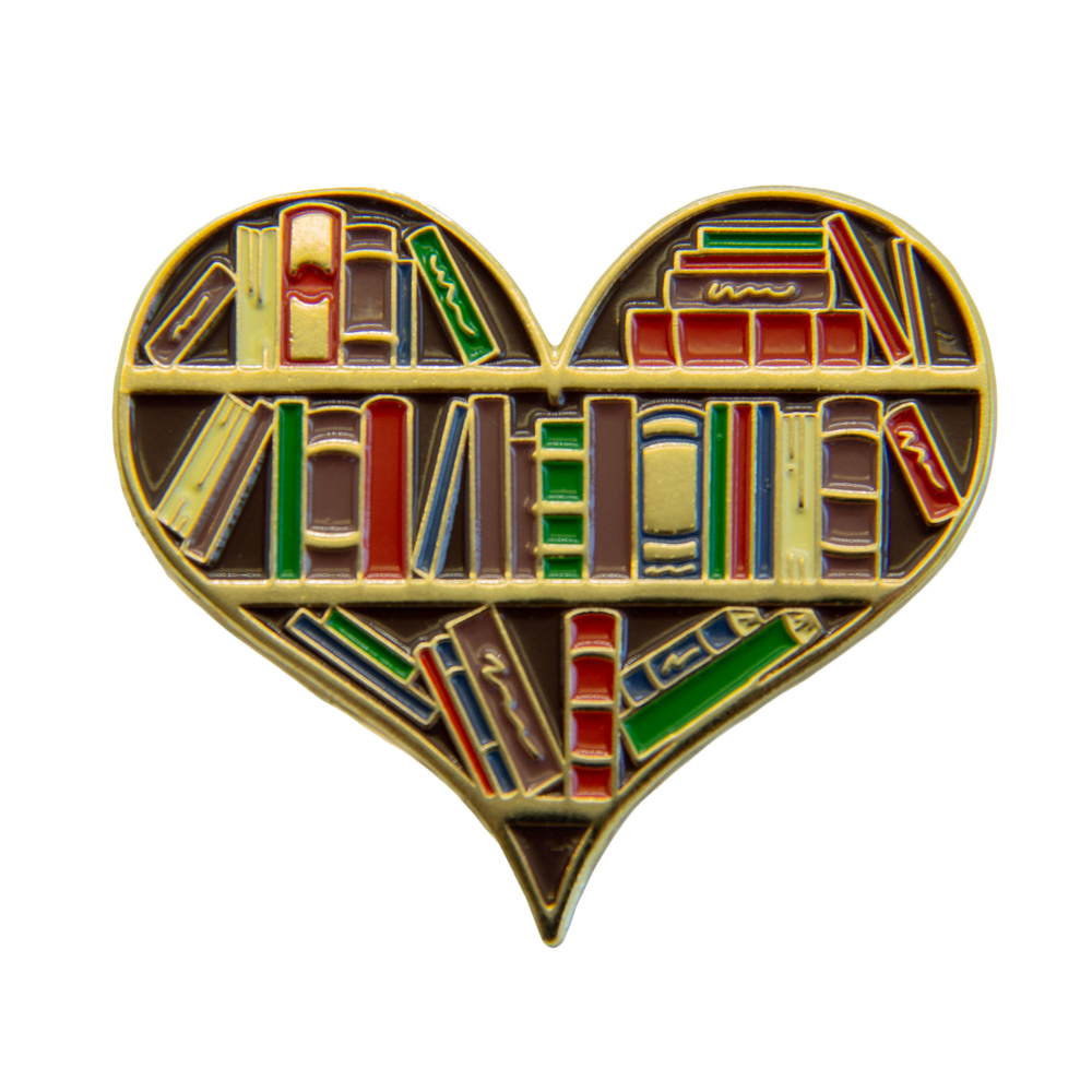Enamel pin brooch of a library book shelf shaped like a heart. 