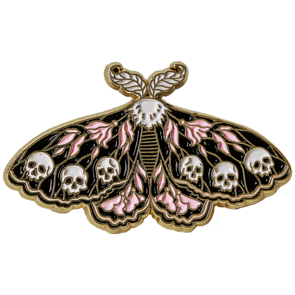 A witchy black and pink enamel pin of a moth with skulls on its wings. 