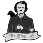 A horror literature themed enamel pin of Edgar Allan Poe with a funny quote. 