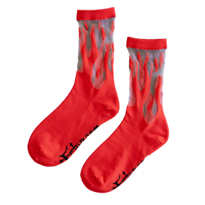 Sheer crew socks with woven red flames for retro 90s inspired fashion. 