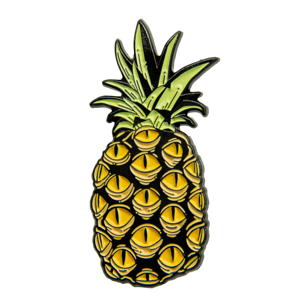 Ectogasm surreal artsy enamel pin of a pineapple with spooky eyes. 