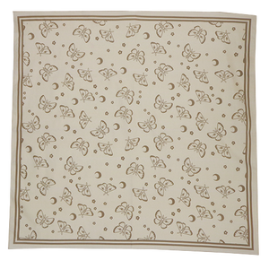 An Ectogasm square cloth printed with moths, moons, and flowers. Can be used as an altar cloth, bandana, or wall art. 