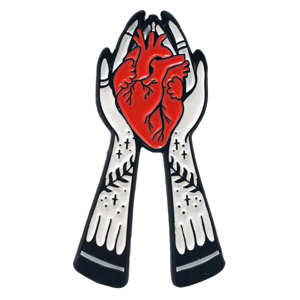 Ectogasm enamel pin gift of hands holding an anatomical heart. 