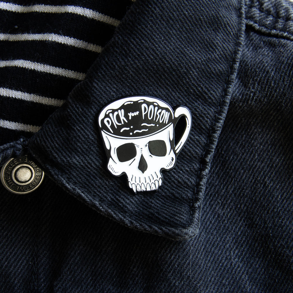 A punk tea and coffee themed enamel pin of a skeleton skull. 