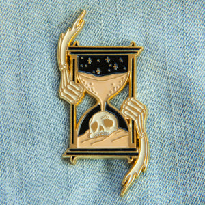 A cool enamel pin of a skull inside an hourglass. Designed by Ectogasm in Los Angeles. 