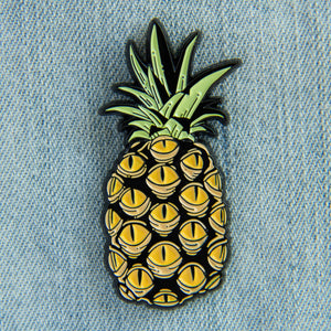 An oddity inspired accessory of a pineapple with creepy yellow eyes. 